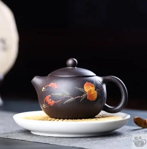 Boule à thé et sa théière