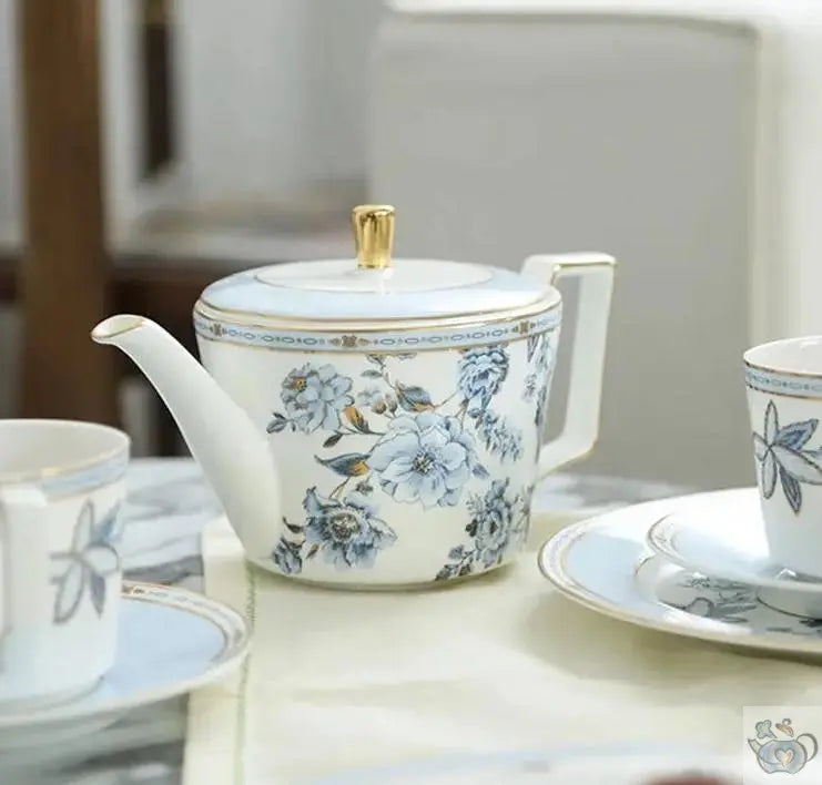 Soft porcelain teapot with floral motifs