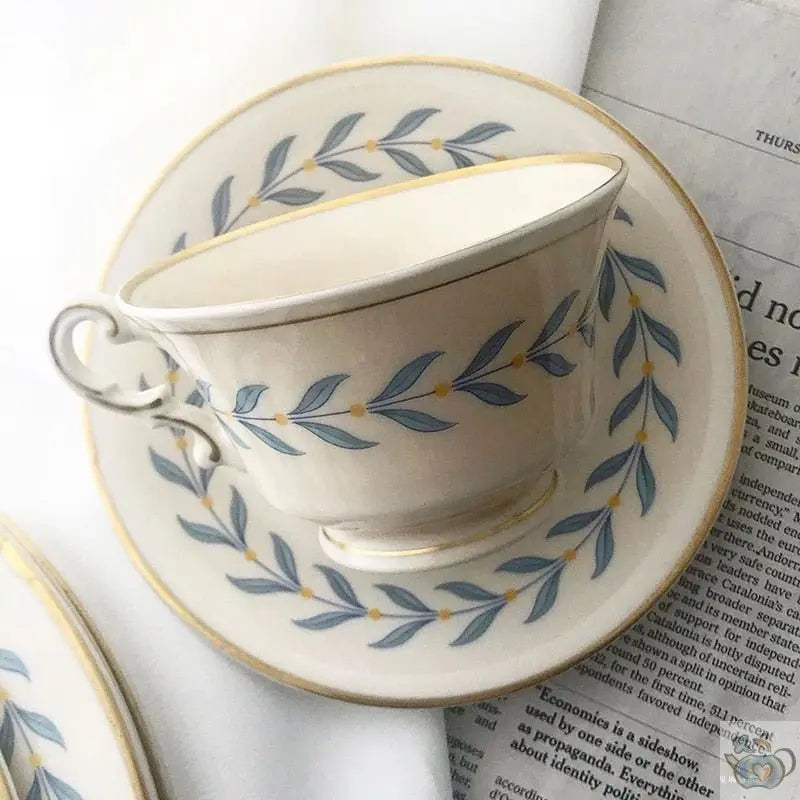 Tasse à thé porcelaine blanche frise végétale | Théières à la folie
