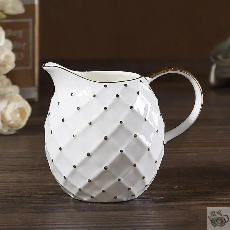 Théière porcelaine blanche "cloutée" de doré | Théières à la folie