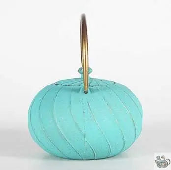 Théière en fonte turquoise motif spiralé | Théières à la folie