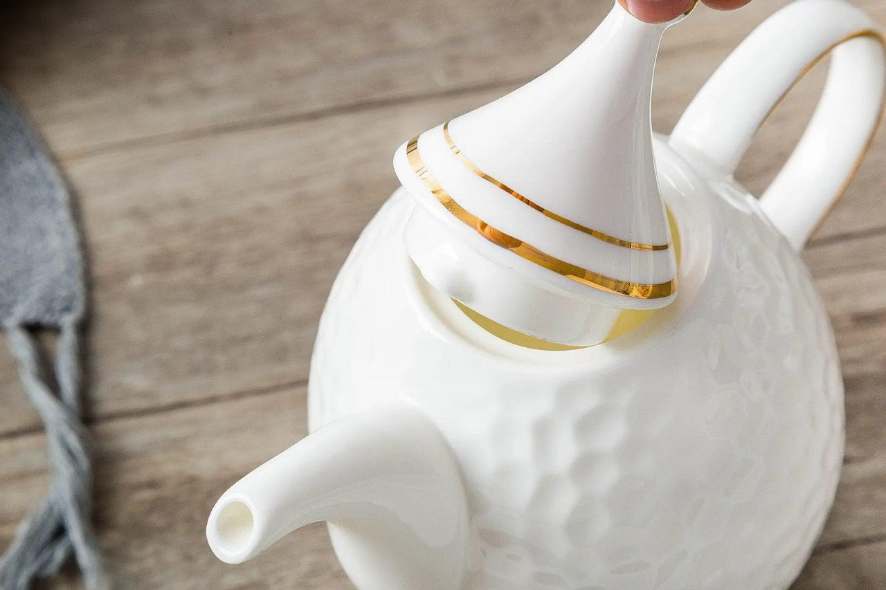Service thé porcelaine blanche créative Théières à la folie