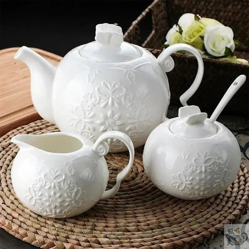 ​Théière blanche relief papillons | Théières à la folie