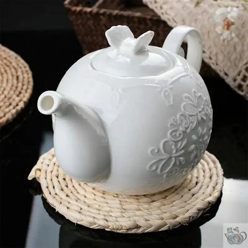 ​Théière blanche relief papillons | Théières à la folie