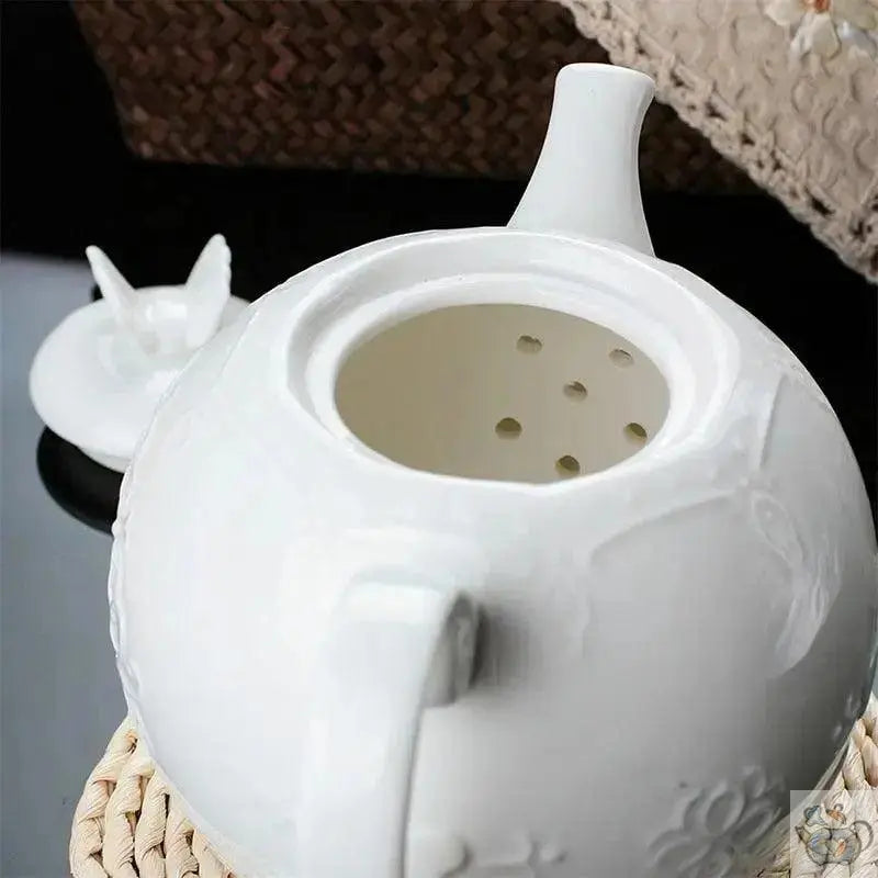 ​Théière blanche relief papillons | Théières à la folie