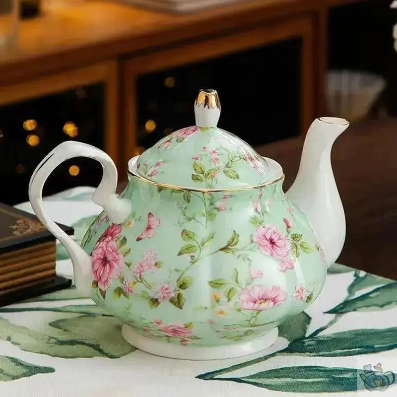 ​Théière en porcelaine anglaise base chauffante  |  Théières à la folie