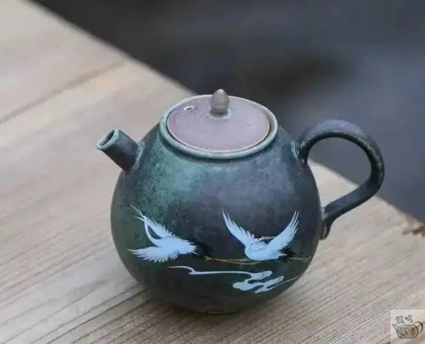 ​Japanse keramische theepot tussen lucht en oceaan | Théières à la folie