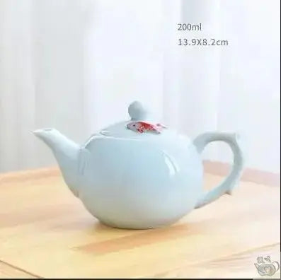​Théière porcelaine céladon et petit poisson | Théières à la folie