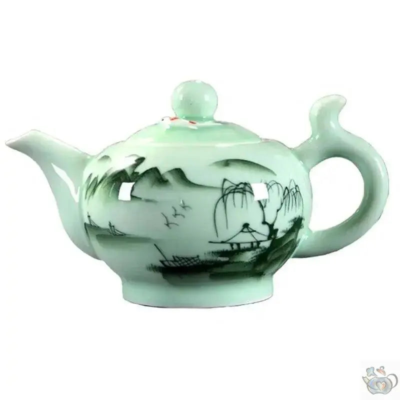​Théière porcelaine vert d'eau et poissons rouges | Théières à la folie