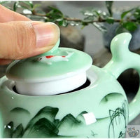 Thumbnail for ​Théière porcelaine vert d'eau et poissons rouges | Théières à la folie