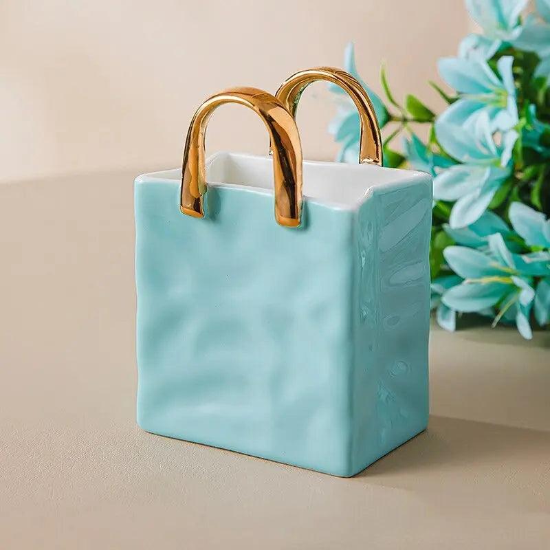 ​Théière blanche, couvercle turquoise | Théières à la folie