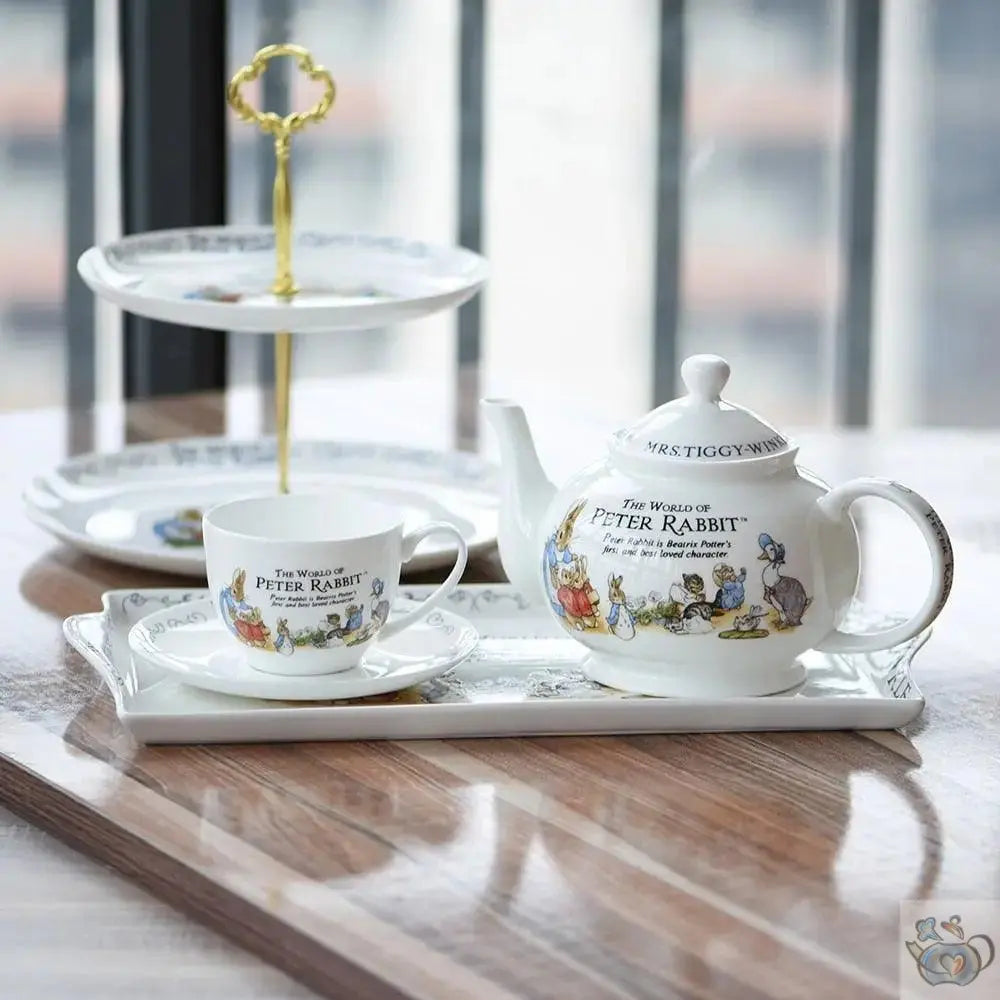 Théière et sa suite en porcelaine "Peter Rabbit" Théières à la folie