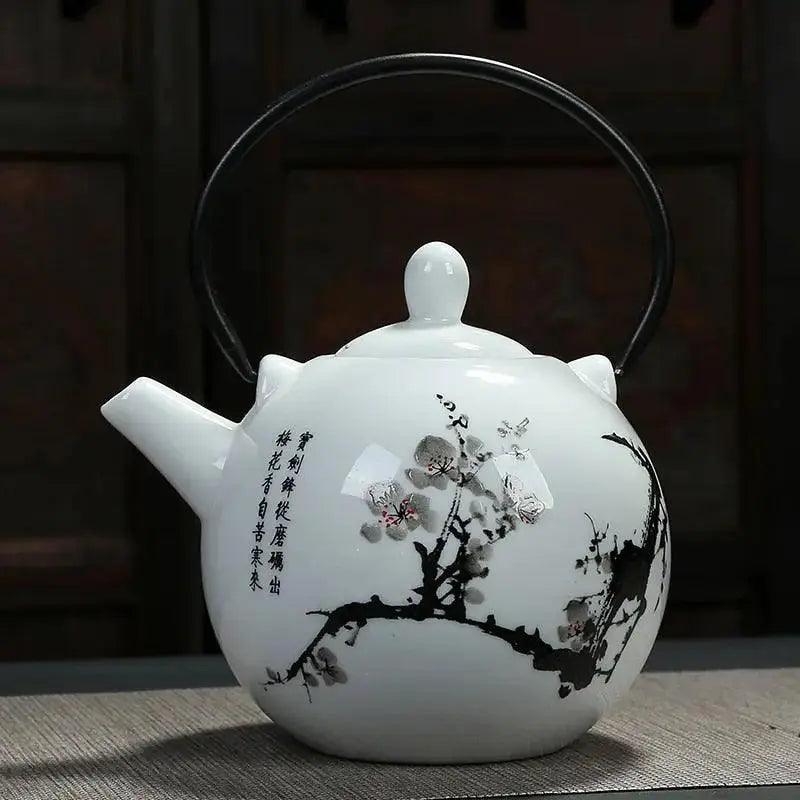 Théière japonaise ronde porcelaine de Jingdezhen Théières à la folie