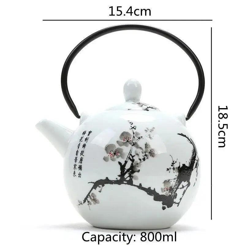 Théière japonaise ronde porcelaine de Jingdezhen Théières à la folie
